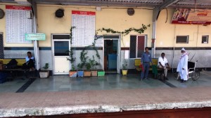 Station Master exchaning all right Signal with through passing train 1