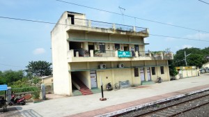 Station Master exchaning all right Signal with through passing train
