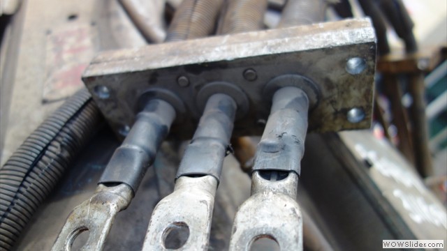 One end on vibrating and another on fixed frame; duty based replacement is necessary