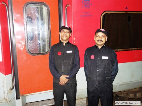 Catering Staff in front of a Rajdhani Coach